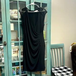 Form fitting black dress by Calvin Klein large